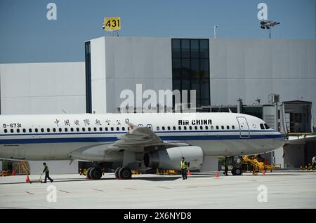HANGZHOU, CHINA - MAY 16, 2024 - Flight CA726 from Osaka, Japan, was parked in the North Three-finger corridor of Terminal T4 of Xiaoshan Internationa Stock Photo