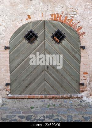 Old ancient wooden gate. Vintage gateway. Stock Photo