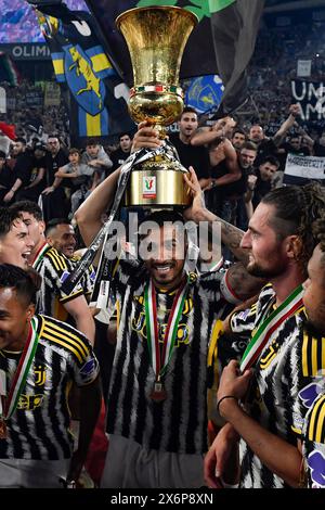 Danilo Luiz da Silva of Juventus FC celebrates with the trophy at the end of the Italy cup final match between Atalanta BC and Juventus FC at Olimpico stadium in Rome (Italy), May 15, 2024. Juventus defeated Atalanta 1-0.Juventus defeated Atalanta 1-0. Stock Photo