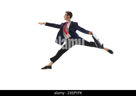 Motivated and ambitious businessman in formal wear, with briefcase in motion, leaping to work isolated on white background Stock Photo