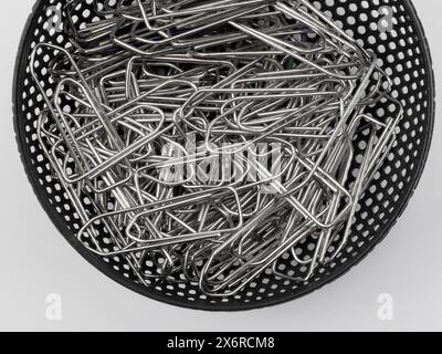 Image of silver paper clips isolated on white background Stock Photo