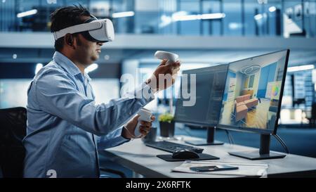 Industrial Software Developer Writing Code and Testing 3D Interior Design Interface. Engineer Editing and Moving Furniture while Wearing Virtual Reality Headset and Using Controllers. Stock Photo