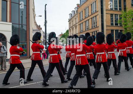 Windsor, Berkshire, UK. 16th May, 2024.It was a busy day today in Windsor, Berkshire as tourists and visitors came to watch the Changing of the Guard. Soldiers marched from Victoria Barracks to Windsor Castle for The Changing the Guard. The guards today were Windsor Castle Guard, Number 12 Company Irish Guards with Musical Support from the Band of the Brigade of Gurkhas. Credit: Maureen McLean/Alamy Live News Stock Photo