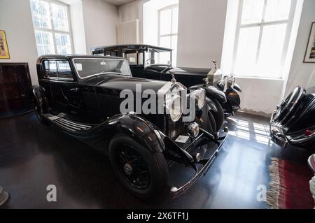 Rolls-Royce Museum in Dornbirn. Two black vintage cars in a building of former factory. Stock Photo