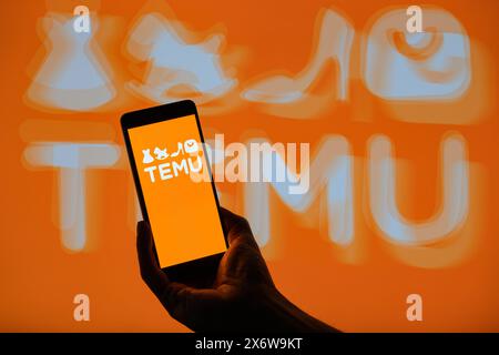 Brussels, Belgium. 16th May, 2024. The Temu logo is displayed on a smartphone with Temu visible in the background in this photo illustration. Taken in Brussels, Belgium. On May 16, 2024. (Jonathan Raa/Sipa USA) *** Strictly for editorial news purposes only *** Credit: Sipa USA/Alamy Live News Stock Photo