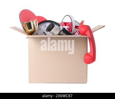 Box of unwanted stuff isolated on white Stock Photo