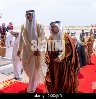 Manama, Bahrain. 16th May, 2024. Receiving Qatar Sheikh Tamim bin Hamad Al Thani (L) attends the 33rd Arab League Summit in Manama, in Bahrain, on Thursday, May 16, 2024, ahead of the 33rd Arab League. Photo by Bahrain News Agency (BNA)/UPI Credit: UPI/Alamy Live News Stock Photo