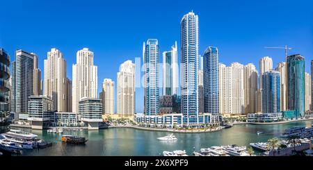 Dubai, United Arab Emirates - February 14, 2024: Dubai Marina Skyline Skyscrapers With Yachts Skyscrapers Living On The Water Panorama In Dubai, Unite Stock Photo
