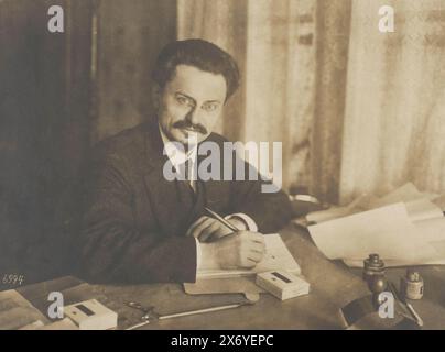 Portrait of Leon Trotsky at a desk, photograph, anonymous, Brest, 1918, baryta paper, gelatin silver print, height, 299 mm × width, 397 mm Stock Photo