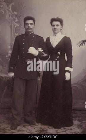 Double portrait of a soldier with his wife, photograph, L.M. de Rijk, (mentioned on object), Utrecht, c. 1890 - c. 1900, photographic support, height, 164 mm × width, 93 mm Stock Photo