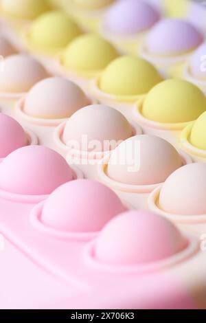 close-up of rubber surface with round bumps background, abstract of circle embossed pattern texture wallpaper or backdrop in selective focus Stock Photo