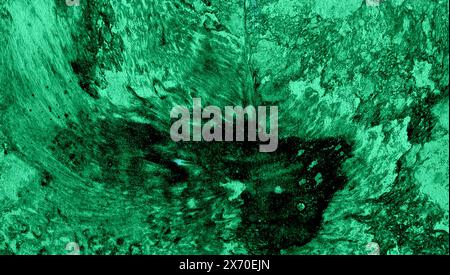 Abstract texture background. Chaotic spots and blurs. Black and green colors that mix with each other to form new shades. Turquoise A large dark spot Stock Photo