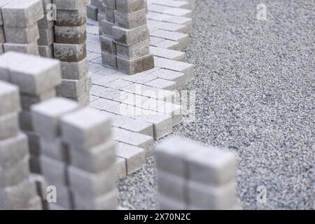 Process of building new path made from concrete blocks, interlocking pave Stock Photo