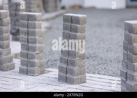 Process of building new path made from concrete blocks, interlocking pave Stock Photo