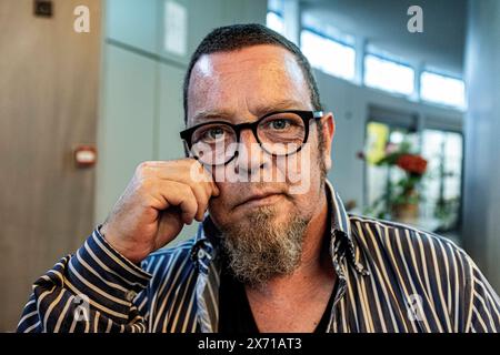 Portrait Guido Koppes Portrait of a 57 year old caucasian, male photo journalist. Amsterdam, Netherlands. MRYES Amsterdam De Cooperatie Noord-Holland Stock Photo