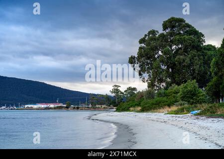Dover Beach with public jetty in distance, Dover Tasmania Stock Photo