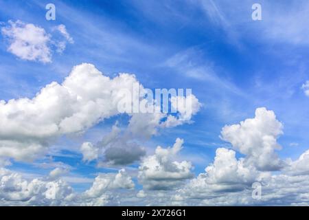 Cumulus clouds and blue sky - central France. Stock Photo