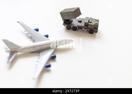 Top view on plastic model military vehicle and aircraft Stock Photo