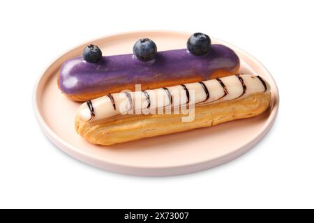 Delicious eclairs covered with glaze isolated on white Stock Photo
