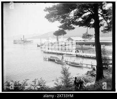 Departing steamer, Fort William Henry Hotel, Lake George, N.Y., 'Mohican' at pier; 'Sagamore' st left., 'G 5470' on negative., Detroit Publishing Co. no. 071147., Gift; State Historical Society of Colorado; 1949,  Mohican (Steamboat) , Sagamore (Steamboat) , Resorts. , Piers & wharves. , Lakes & ponds. , Steamboats. , United States, New York (State), Lake George. , United States, New York (State), George, Lake. Stock Photo