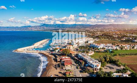 View of Latchi port, Akamas peninsula, Polis Chrysochous, Paphos, Cyprus. The Latsi harbour with boats and yachts, fish restaurant, promenade, beach t Stock Photo