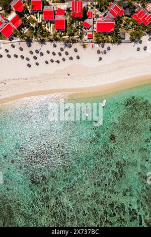 Beautiful Mauritius Island with gorgeous beach Flic en Flac, aerial view from drone. Mauritius, Black River, Flic-en-Flac view of oceanside village be Stock Photo