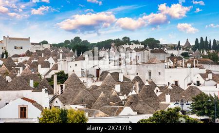 The traditional Trulli houses in Alberobello city, Apulia, Italy. Cityscape over the traditional roofs of the Trulli, original and old houses of this Stock Photo