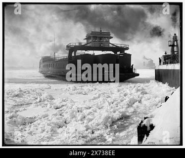 Car ferry, Michigan Central, entering slip, Detroit River, Locale in Detroit based on Detroit, Catalogue J (1901)., Detroit Publishing Co. no. 05572., Gift; State Historical Society of Colorado; 1949., Heading(s) in 610 field(s) unverified,  Michigan Central (Ferry) , Railroad cars. , Ferries. , Rivers. , Ice. , Winter. , Piers & wharves. , United States, Michigan, Detroit River. , United States, Michigan, Detroit. Stock Photo