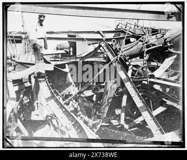 Wreck of the Maria Teresa, Battle of Santiago, 1898, forward bridge, Date based on Detroit, Catalogue J (1901)., '810' on negative., Detroit Publishing Co. no. 021528., Gift; State Historical Society of Colorado; 1949,  Infanta Maria Teresa (Ship) , Government vessels, Spanish. , War damage. , Naval warfare. , Santiago, Battle of, Santiago de Cuba, Cuba, 1898. , Cuba, Santiago de Cuba. Stock Photo