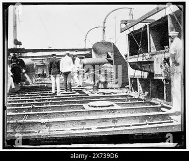 Wreck of the Maria Teresa, Battle of Santiago, 1898, Lieut. Hobson inspecting the ship, Date based on Detroit, Catalogue J (1901)., Detroit Publishing Co. no. 021529., Gift; State Historical Society of Colorado; 1949,  Hobson, Richmond Pearson,, 1870-1937. , Infanta Maria Teresa (Ship) , Government vessels, Spanish. , Military officers, American. , Santiago, Battle of, Santiago de Cuba, Cuba, 1898. , Naval warfare. , War damage. , Cuba, Santiago de Cuba. Stock Photo