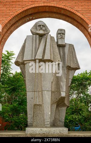 A statue of Karl Marx and  Friedrich Engels at the Memento Park, Budapest, Hungary Stock Photo