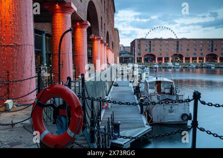 Night falls at Albert Dock in Liverpool, England. Stock Photo