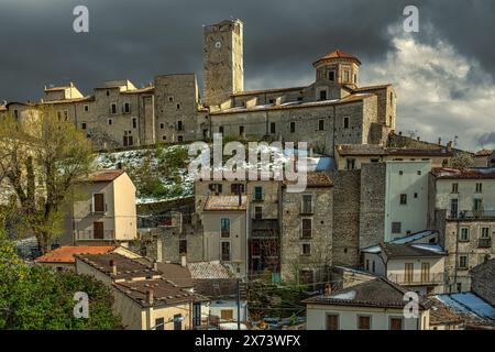 Panorama of the ancient medieval village of Castel del Monte with the church of San Marco Evangelista overlooking the town.Castel del Monte, Abruzzo Stock Photo