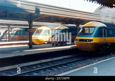 Paddington Station in 1985, with British Rail Intercity 125 HST diesel trains - Class 43 High Speed Train power car in original blue and yellow scheme. London Paddington railway station in the 1980s. Stock Photo