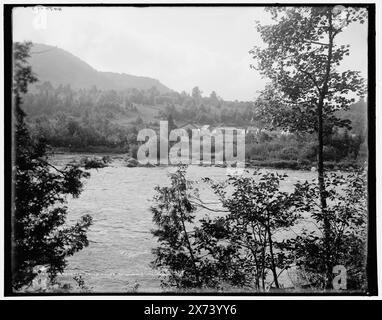Raquette Falls House, Adirondack Mountains, Probably the Raquette River in foreground., 'WHJ 993' on negative., Detroit Publishing Co. no. 014862., Gift; State Historical Society of Colorado; 1949,  Hotels. , Rivers. , United States, New York (State), Adirondack Mountains. , United States, New York (State), Raquette River. Stock Photo