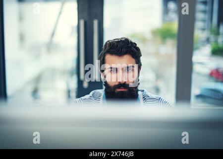 Computer, thinking and business man in office for online research, reading or technical solution. Process engineer, review and serious male employee Stock Photo