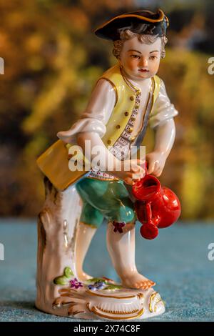 Close-up of a small antique sculpture made of Meissen porcelain Stock Photo