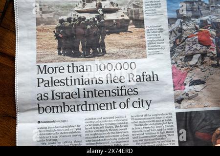 'More than 100,000 Palestinians flee Rafah as Israel intensifies bombardment of city' Guardian newspaper headline 10 May 2024 Gaza war article UK Stock Photo