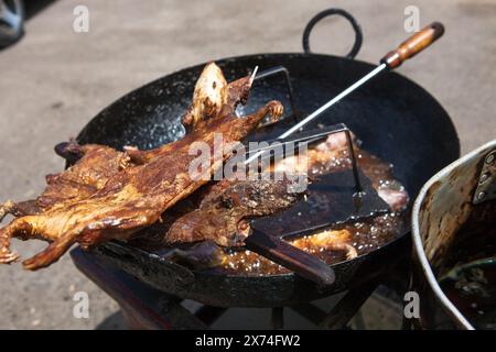 Fried cuy, guinea pig, or guinea pig, is a traditional food of the Andes. It is valued for the nutritional quality of the meat. Stock Photo