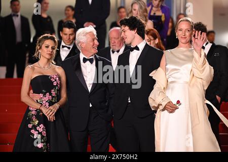 (left to right) Alejandra Silva, Richard Gere, Homer James Jigme Gere and Uma Thurman arrive for the screening of the film 'Oh Canada' during the 77th Cannes Film Festival in Cannes, France. Picture date: Friday May 17, 2024. Stock Photo