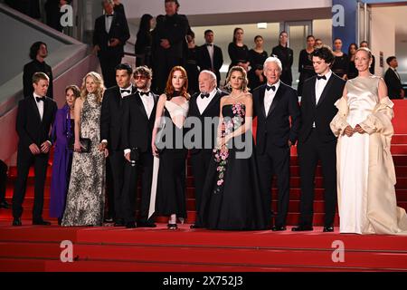 (left to right) Tiffany Boyle, Luisa Law, Tiffany Boyle, a guest, Andrew Wonder, Taylor Jeanne, Paul Schrader, Penelope Mitchell, Alejandra Silva, Richard Gere, Homer James Jigme Gere and Uma Thurman arrive for the screening of the film 'Oh Canada' during the 77th Cannes Film Festival in Cannes, France. Picture date: Friday May 17, 2024. Stock Photo