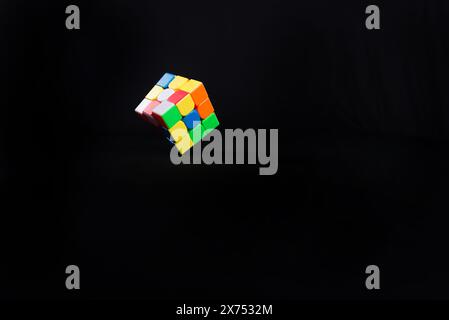 Salvador, Bahia, Brazil - May 15, 2024: Magic cube or Rubiks cube on white background. Invention by Hungarian architect Erno Rubik in 1974 Stock Photo