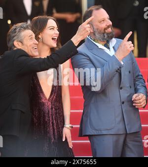 Greek director Yorgos Lanthimos, American actress Emma Stone and actor Willem Dafoe attend the premiere of Kinds Of Kindness at the 77th Cannes Film Festival in Cannes, France on Friday, May 17, 2024. Photo by Rune Hellestad/ UPI Stock Photo