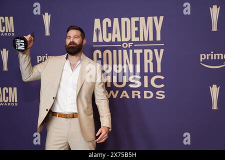 Frisco, United States. 16th May, 2024. Jordan Davis is posing with their prize in the press room during the 59th Academy of Country Music Awards Ceremony at The Ford Center at the Star in Frisco, United States, on May 16, 2024. (Photo by Javier Vicencio/Eyepix Group) (Photo by Eyepix/NurPhoto) Credit: NurPhoto SRL/Alamy Live News Stock Photo