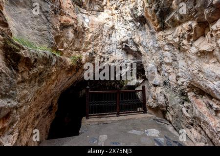 People visiting the sacred place, Eshab-i Kehf Cave ( Seven Sleepers Cave). The Seven Sleepers Ruins or Ashab-ı Kehf Cave located at Tarsus, Turkey, i Stock Photo