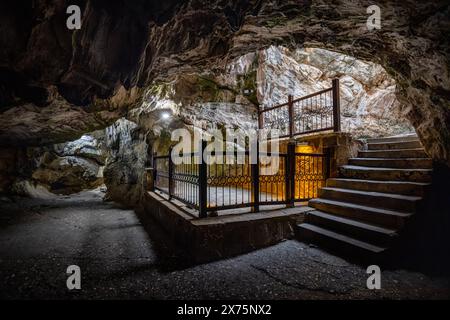 People visiting the sacred place, Eshab-i Kehf Cave ( Seven Sleepers Cave). The Seven Sleepers Ruins or Ashab-ı Kehf Cave located at Tarsus, Turkey, i Stock Photo