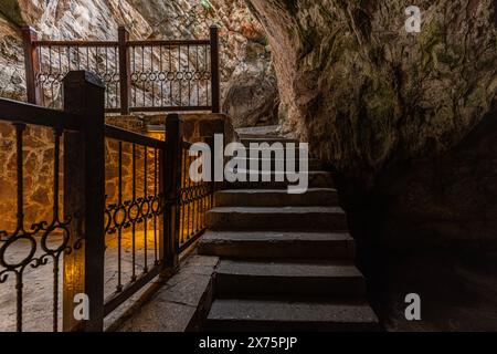 People visiting the sacred place, Eshab-i Kehf Cave ( Seven Sleepers Cave). The Seven Sleepers Ruins or Ashab-ı Kehf Cave located at Tarsus, Turkey, i Stock Photo