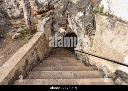 People visiting the sacred place, Eshab-i Kehf Cave ( Seven Sleepers Cave). The Seven Sleepers Ruins or Ashab-ı Kehf Cave located at Tarsus, Turkey, i Stock Photo