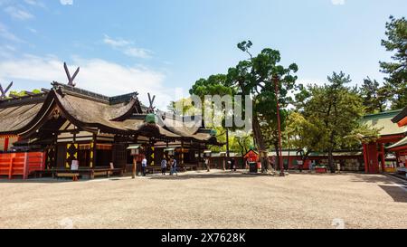 Osaka, Japan, April 15, 2024: Buddhist and Shinto sacred temple precinct in Osaka City. Stock Photo