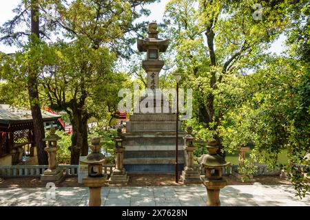 Osaka, Japan, April 16, 2024: Stone ornament at the temple precinct in Osaka. Stock Photo